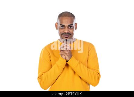 Afroamerican guy wearing a yellow jersey isolated on a white background Stock Photo