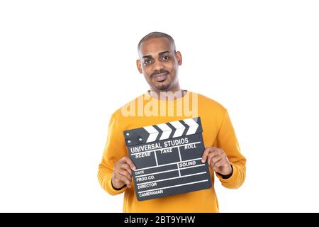 African guy with yellow T-shirt isolated on a white background Stock Photo