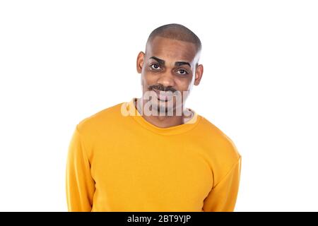 Afroamerican guy wearing a yellow jersey isolated on a white background Stock Photo