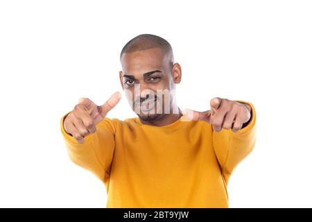 Afroamerican guy wearing a yellow jersey isolated on a white background Stock Photo