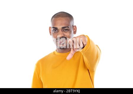 Afroamerican guy wearing a yellow jersey isolated on a white background Stock Photo