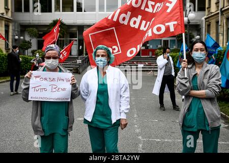 Turin, Italy - 30 April, 2020: A medical worker holds a placard reading 'Maybe everything is not fine' during a medical workers protest organized by CGIL and UIL trade unions against dysfunctions in the Piedmont region's handling of the COVID-19 coronavirus crisis. Credit: Nicolò Campo/Alamy Live News Stock Photo