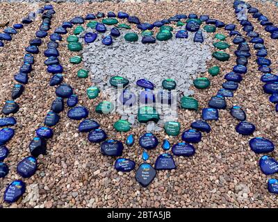 A Long Eaton (Derbyshire) resident and NHS worker presents a Tribute and Memorial to the dedicated members of the NHS and Social Care family who gave their lives during the fight against COVID-19. Stock Photo