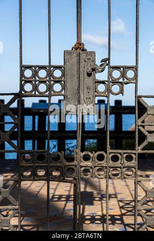 Large heavy wrought iron lock on gates at Las Rocas during phase one of de-escalation of the Covid 19, coronavirus, State of Emergency, Costa Adeje, T Stock Photo