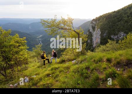 Two women hiking in the mountains Stock Photo