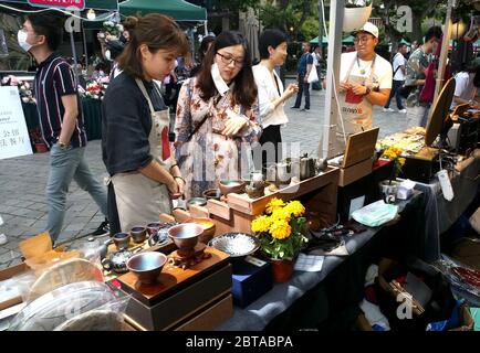 Shanghai, China. 24th May, 2020. Tourists are seen at a night fair of Sinan Mansions in Shanghai, east China, May 24, 2020. A night fair of Sinan Mansions with food stalls, open air museum and art exhibitions etc., opened to boost Shanghai's nighttime economy. Credit: Chen Fei/Xinhua/Alamy Live News Stock Photo