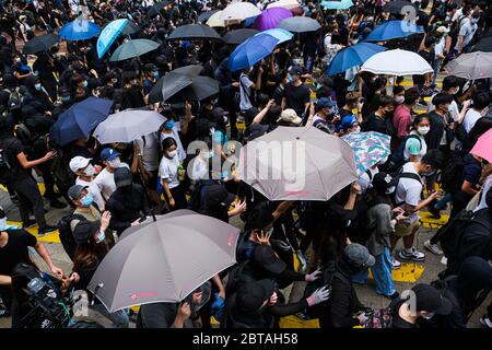 Hong Kong, China. 24th May, 2020. Protesters take part during an anti-government rally. Beijing is pushing to implement tough new national security laws and anti-sedition law on the city's behalf and bypassing Hong Kong's legislature. Credit: SOPA Images Limited/Alamy Live News Stock Photo