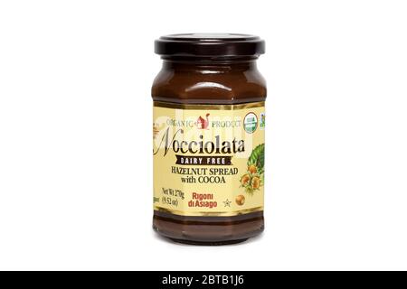 A jar of Rigoni di Asiago brand organic Nocciolata dairy-free hazelnut spread with cocoa isolated on a white background. cutout for illustration edito Stock Photo