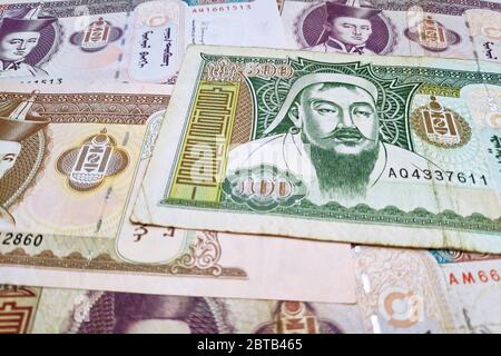 Stack of Mongolian tugrik banknotes as background. Stock Photo