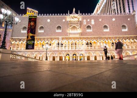 LAS VEGAS, NEVADA - FEBRUARY 23, 2020:  View of Venetian Resort in Las Vegas seen at night with lights illuminated Stock Photo