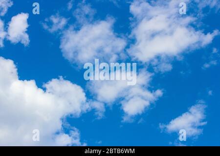 White clouds in the blue sky as background Stock Photo