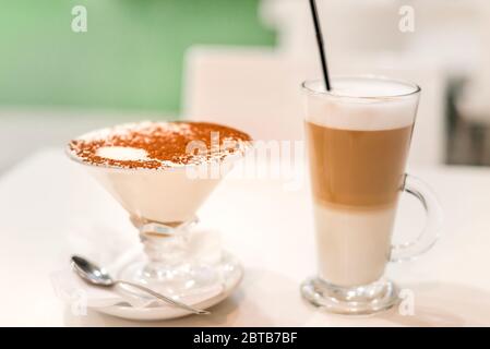 Traditional Italian dessert tiramisu in a glass beaker Stock Photo