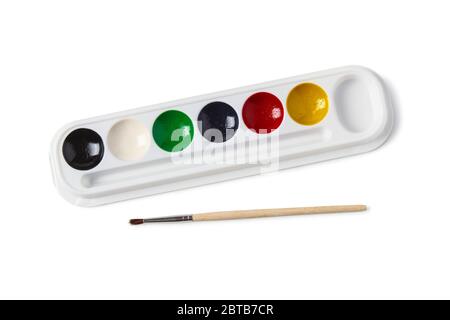 Children's watercolor paints and brush for painting isolated on a white background Stock Photo