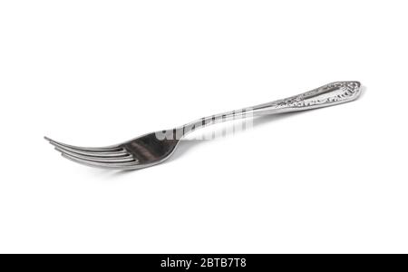 Metal fork close-up isolated on a white background Stock Photo