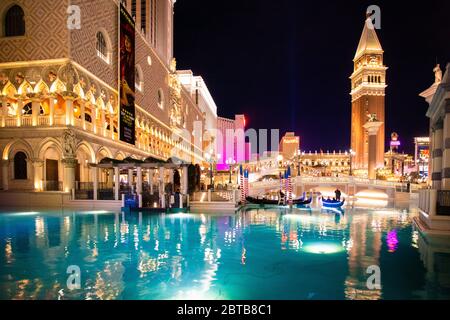 LAS VEGAS, NEVADA - FEBRUARY 23, 2020:  View of Venetian Resort in Las Vegas seen at night with lights illuminated and Grand Canal Stock Photo