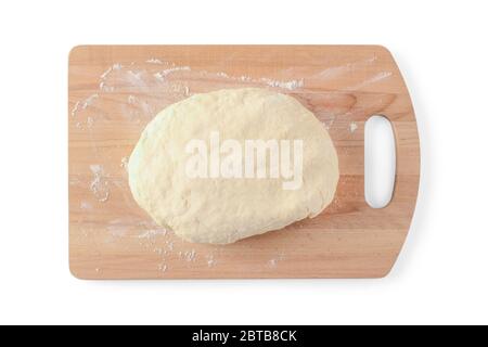 Slice of dough in flour on a cutting board isolated on white. View from above Stock Photo