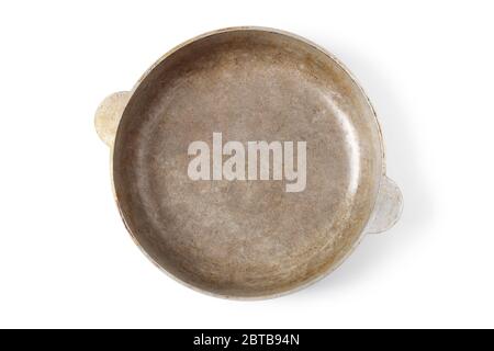 Large old aluminum frying pan isolated on a white background. View from above Stock Photo
