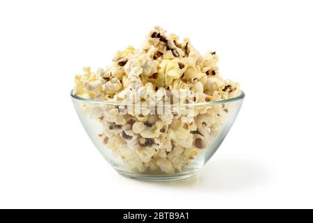 Popcorn in a glass cup isolated on white Stock Photo
