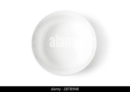 Deep white porcelain dish isolated on white. View from above Stock Photo