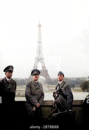 1940 , 23 june, Paris , FRANCE : The german Fuhrer dictator  ADOLF HITLER ( 1889 - 1945  ) with architect ALBERT SPEER ( 1905 - 1981 ) (at left side) and sculptor ARNO BRECKER ( 1900 - 1991 ) at Trocadero in Paris , in background the tower Tour EIFFEL . Photo propaganda by Hitler personal photographer Heinrich Hoffmann . DIGITALLY COLORIZED . - WWII - NAZI - NAZIST - NAZISM - NAZISTA - NAZISMO - SECONDA GUERRA MONDIALE - dittatore - POLITICA - POLITICO - Parigi - ARCHITETTO - ARCHITETTURA - ARCHITECTURE --- Archivio GBB Stock Photo