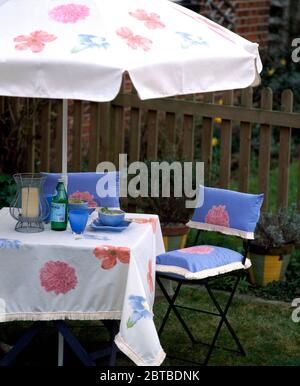 Floral Appliqued Garden Umbrella And Tablecloth Stock Photo Alamy