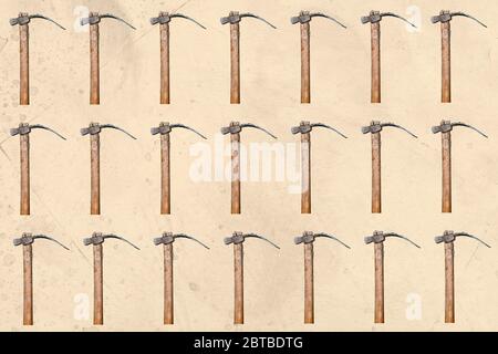 Mosaic of some wooden hoes on a textured pastel background. Gardening tools. Stock Photo