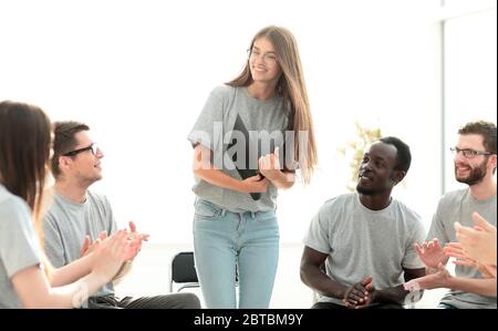 discussion group of young people applauding the speaker Stock Photo