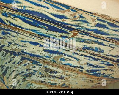 abstract image of machine-sanded blue & white paintwork on hull planks of traditional wooden boat being restored at Old Malindi, Kenya coast, Africa Stock Photo