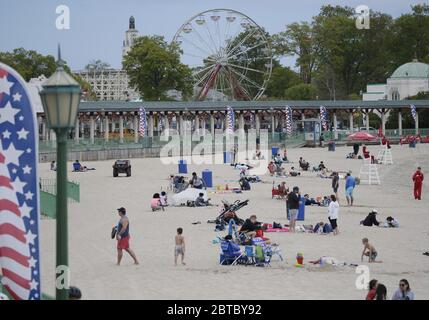 Rye, United States. 24th May, 2020. People gather at the beach for Memorial Day Weekend at Rye Playland Beach during the Coronavirus Pandemic in New York City on Sunday, May 24, 2020. More than 5.3 million cases of COVID-19 have been reported worldwide resulting in over 343,000 deaths. Photo by John Angelillo/UPI Credit: UPI/Alamy Live News Stock Photo