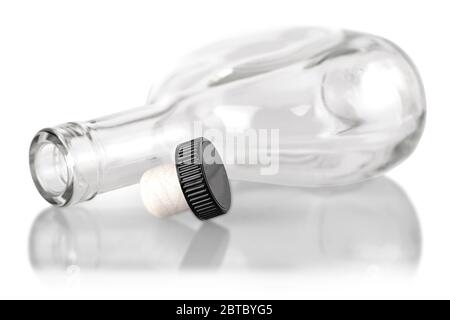 The empty clear cognac bottle isolated on white background Stock Photo