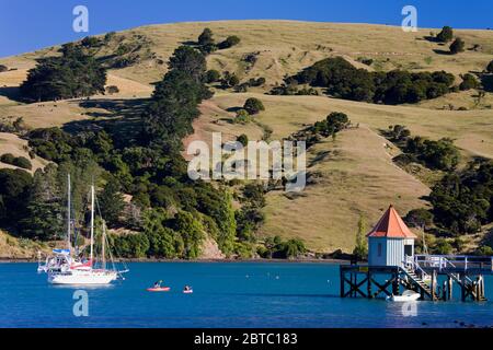 Daly's Wharf in French Bay,Akaroa,Banks Peninsula,Canterbury District,South Island,New Zealand Stock Photo