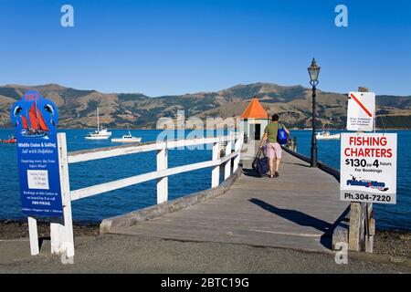 Daly's Wharf in French Bay,Akaroa,Banks Peninsula,Canterbury District,South Island,New Zealand Stock Photo