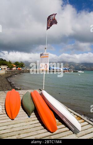 Canoes in French Bay,Akaroa,Banks Peninsula,Canterbury District,South Island,New Zealand Stock Photo