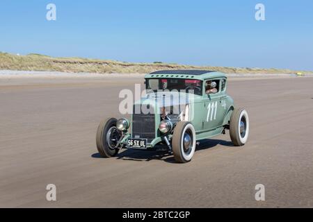 Old American cars Hot Rods on Pendine Sands, Carmarthenshire, Wales UK Stock Photo