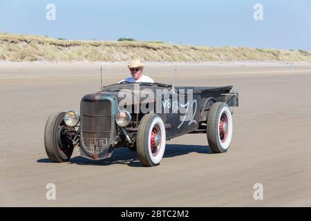 Old American cars Hot Rods on Pendine Sands, Carmarthenshire, Wales UK Stock Photo