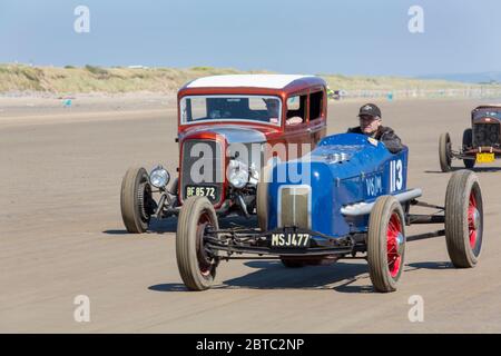 Old American cars Hot Rods on Pendine Sands, Carmarthenshire, Wales UK Stock Photo