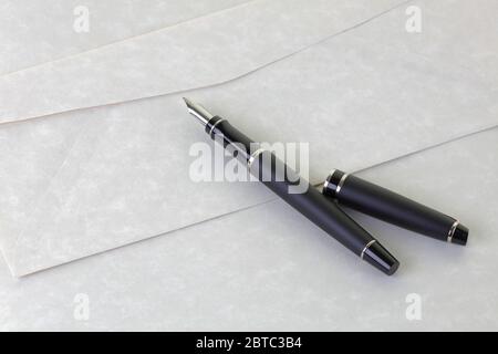 Pen letter and writing paper with envelope Stock Photo