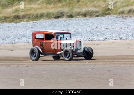 Old American cars Hot Rods on Pendine Sands, Carmarthenshire, Wales UK Stock Photo