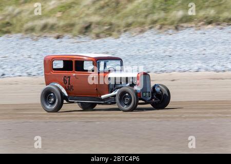 Old American cars Hot Rods on Pendine Sands, Carmarthenshire, Wales UK Stock Photo