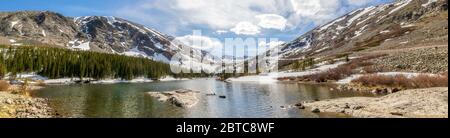 Panoramic springtime view of Blue Lakes in Colorado with clouds and blue skies Stock Photo