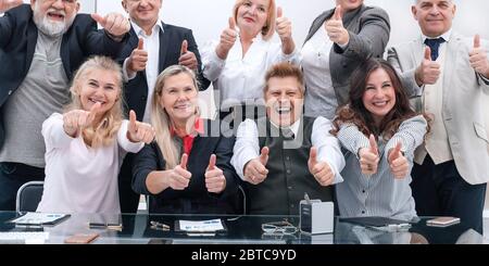 large group of happy employees showing their success Stock Photo