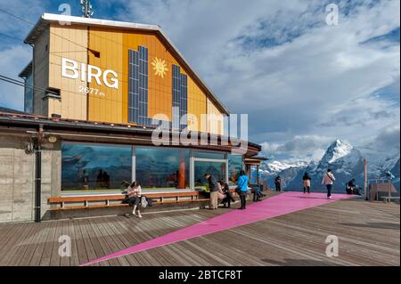 The viewpoint deck located at Birg cableway station to view the Jungfrau, the famous summit of the Bernese Alps in Switzerland Stock Photo