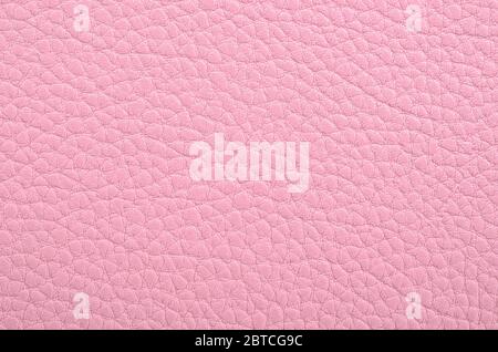 Pink leather texture as background. Stock Photo