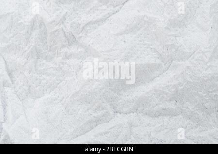 Crumpled tissue paper background texture as background. Stock Photo