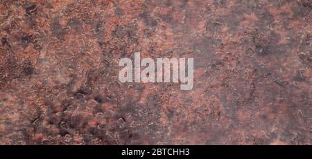 Dark brown marble, polished surface of natural stone close-up. Background, texture. Stock Photo