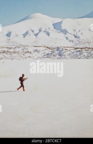 March 1976 - Ski touring on the frozen snow covered surface of Kulik Lake, Katmai National Monument, Alaska Stock Photo