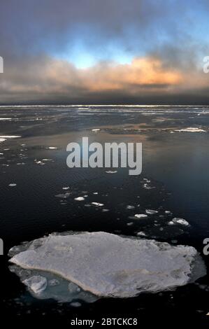 The clouds begin to thin over the Arctic Ocean Sept. 9, 2009. Stock Photo