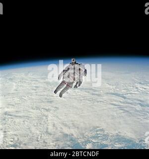 Astronauts activities during Extravehicular Activity (EV)-1. Here Astronaut Robert Stewart during Manned Maneuvering Unit (MMU) Exercise untethered above the Earth.February 11, 1984 Stock Photo