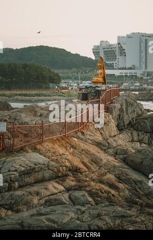 Busan, South Korea - 22 May 2020: Haedong Yonggungsa, self-advertised as Korea's most beautiful temple, sits on a rocky shoreline north of Busan. Stock Photo