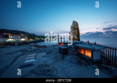 Busan, South Korea - 22 May 2020: Haedong Yonggungsa, self-advertised as Korea's most beautiful temple, sits on a rocky shoreline north of Busan. Stock Photo